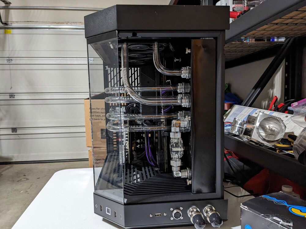 Here we re-did that bottom-pipe for the top rad with a wider-radius bend.  You can see the runs to the CPU/GPU aren't perfectly straight to due the can not having a lip like the real mandrels, but I'm very happy with how it turned-out.