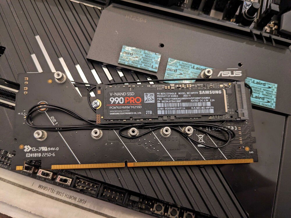 ASUS DIMM.2 module has thermal probe headers, but only long-ass cables.  Had to wrap them all creatively-like to get them inside with the probe against the chips without disrupting thermal-pad contact.