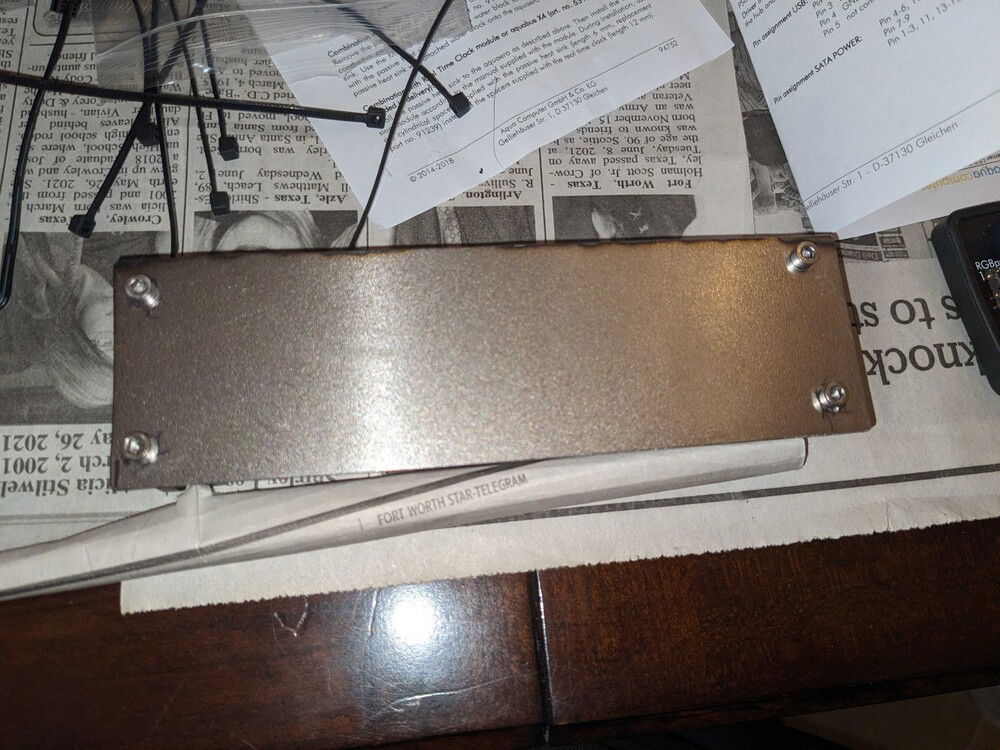 I had leftover sheet metal, so I made it a little backplate I can use to velcro-mount it.