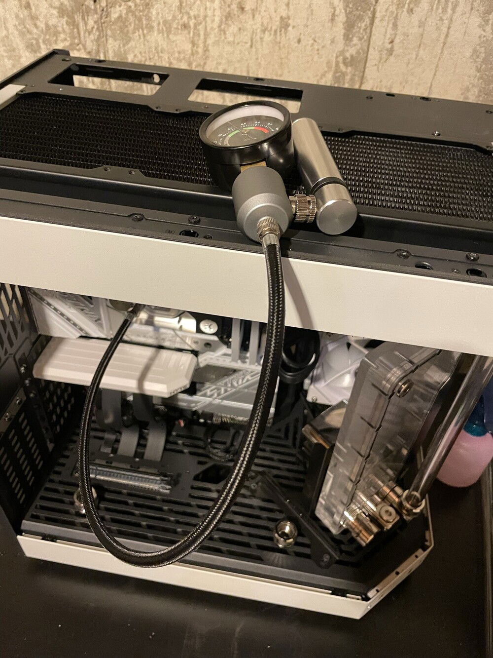 At this point, half the loop was done, and I'm on hold until I build up the courage to tear apart the GPU and add it's waterblock. So perfect time to plug both ends and leak test. This is where I found out that the EK Torque drain wasn't fully closed.