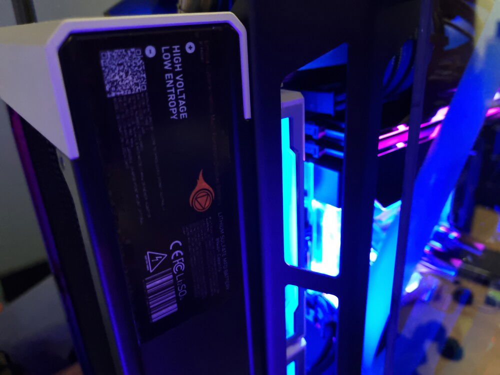 Detail of some decals I used to decorate the build and the side of a Lian Li SL-INF attached to the radiator.