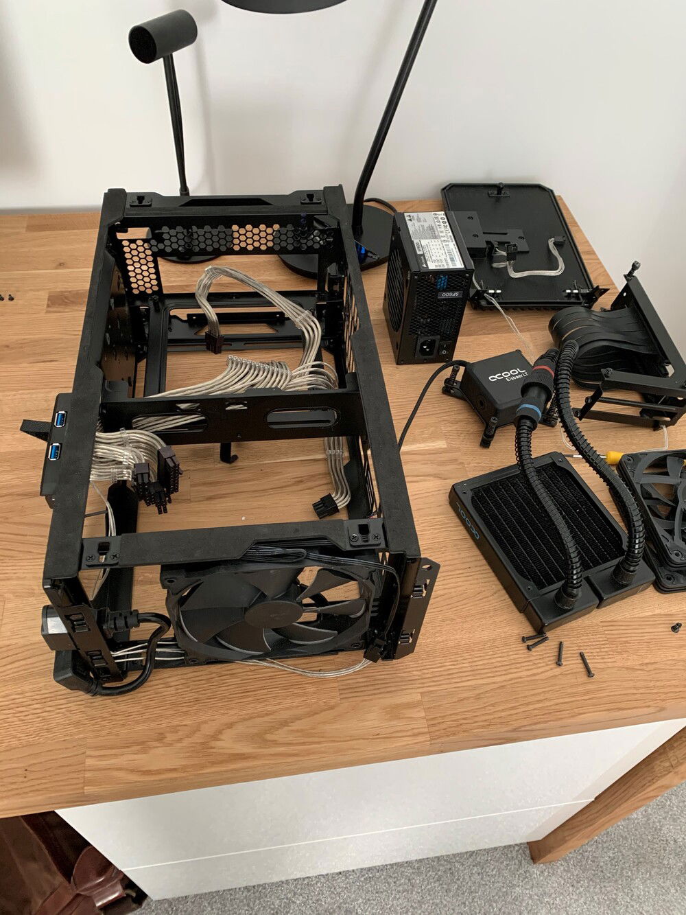 Early builds used an AlphaCool LT solo.