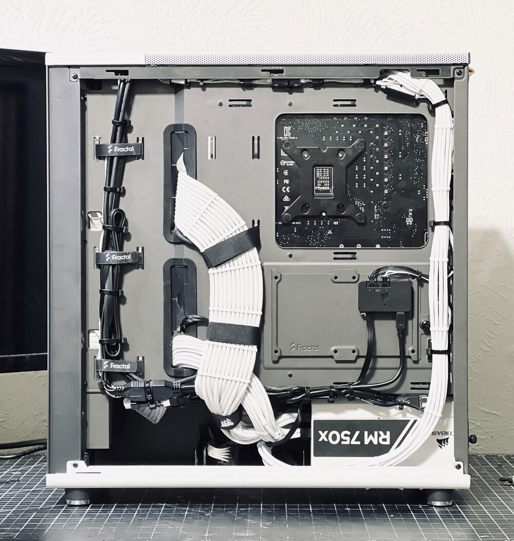 Cables are handmade with Teleios sleeving. I spent more than a couple of hours on cable management. Hardly anyone will see it, but I know it's there.