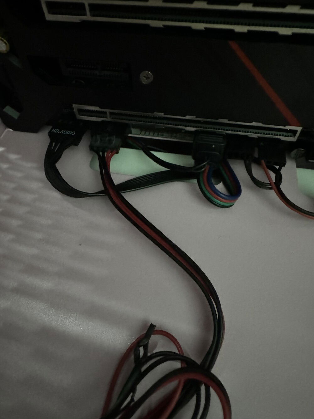 Attaching the Thunderbolt card GPIO link.