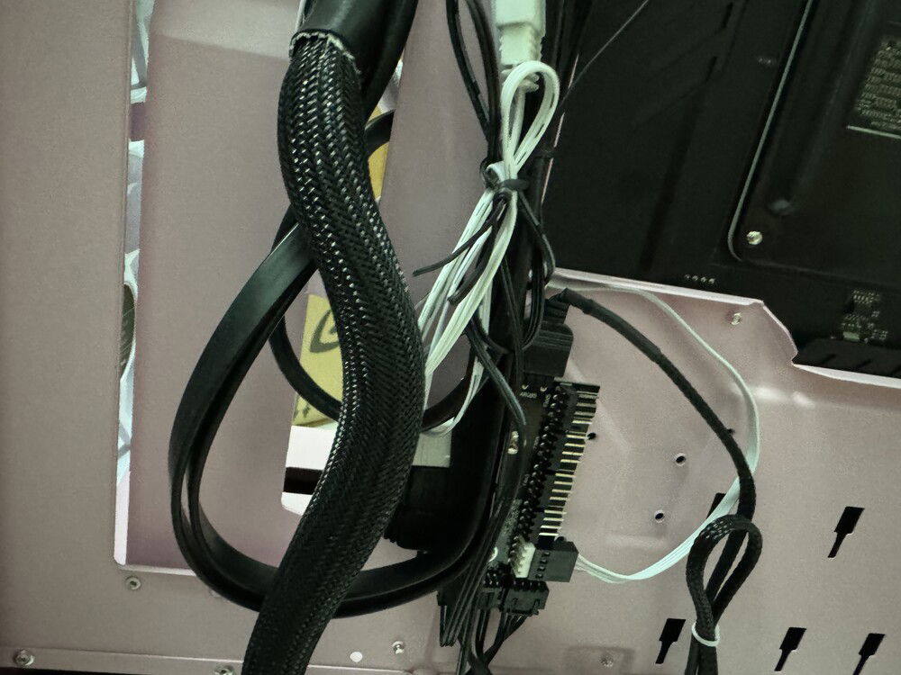 The ARGB controller/splitter as provided by Lian Li. Hopefully the fact that it needs SATA power means it won't drain power off the ARGB header of the Mobo.