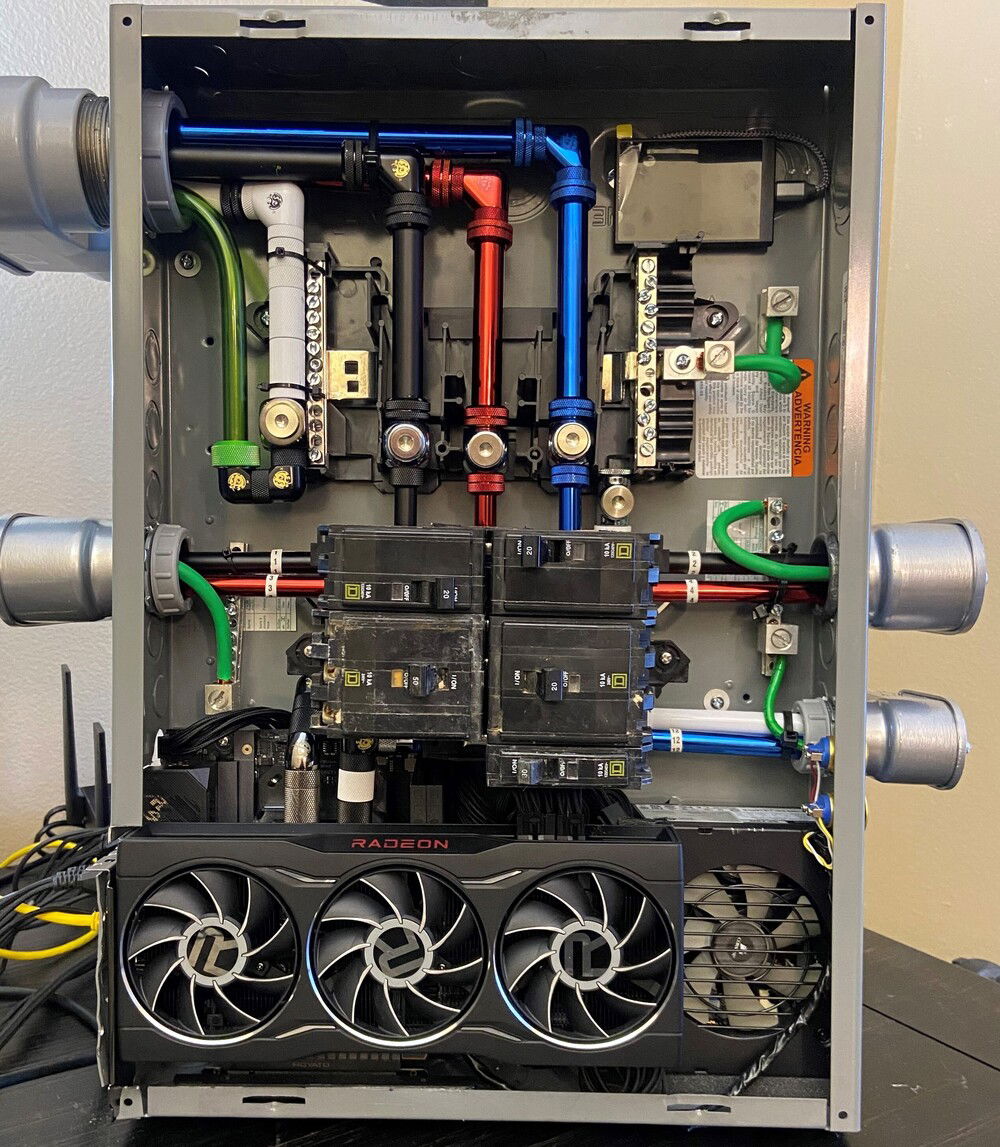 Picked up a reference 6750 XT. Gives it more of a mechanical look. Put in a stat screen, added some old breakers. New breakers are expensive and go in my real panels :)