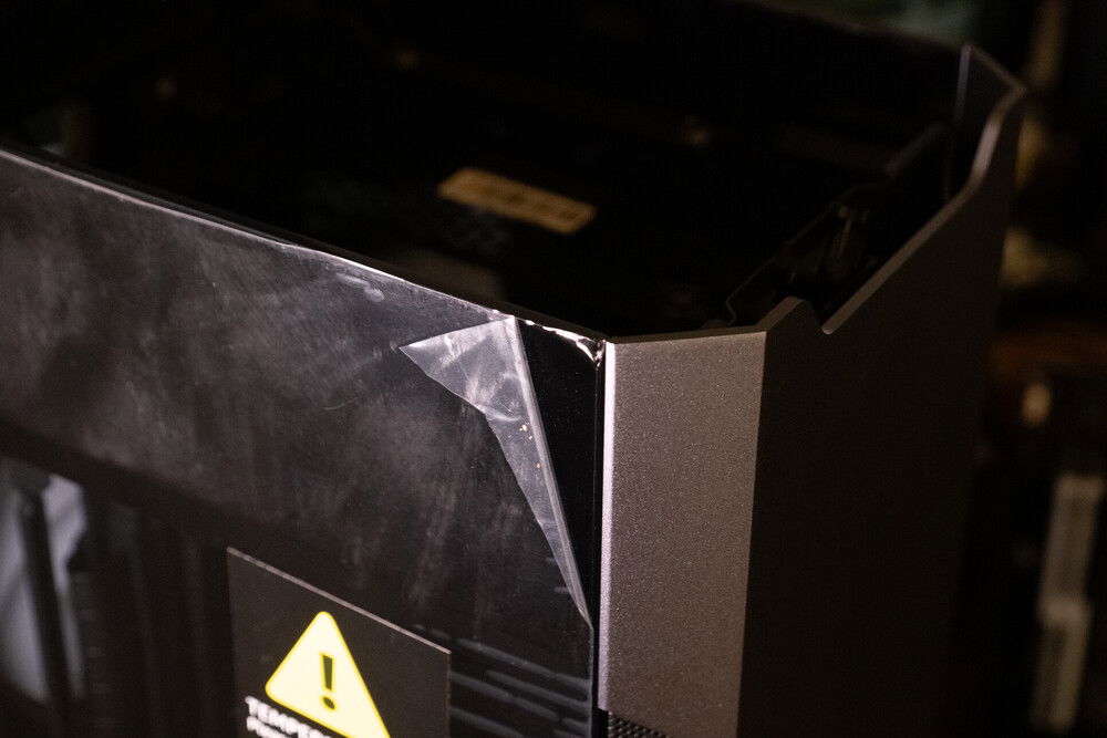 small ship on one of the tempered glass corner.