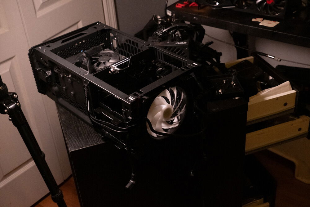 Originally had the 140mm Phantek D-RGB fan on the bottom pulling air and the 2 EK fan as exhaust. Change the setup later.