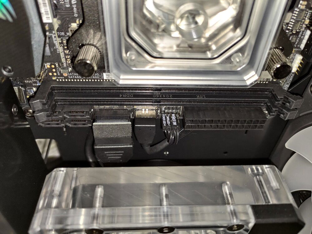 90 degree USB cable adapters. USB 3 was hard to find, had to order it directly from Asrock support.