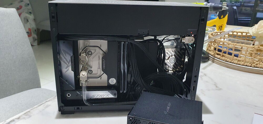 Fittings: CPU -> 7mm static offset -> micro 90 adapter (on both ports of CPU block). Triple bend to get from CPU to GPU. Very tight! Just barely clears the M.2 stack on the motherboard.