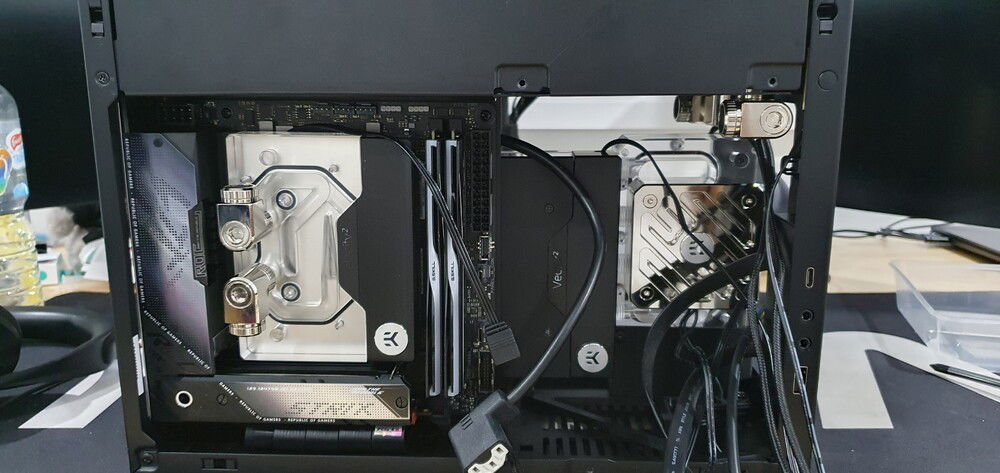 Each port of the radiator has the following configuration: Rad -> 14mm rotary offset -> micro 90 adapter -> micro 90 adapter. The 14 mm rotary offset give some flexibility to position the opening near the side panel to line up perfectly with CPU block fittings. This also helps on GPU side to line up with port on the reservoir.
