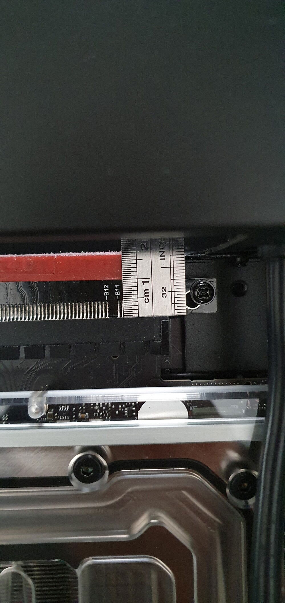 I had to sand down the red part on the LINKUP PCIe riser cable because it was hitting the fans on the radiator. It's about 17mm from the bottom of black connector after sanding. It's just plastic up there so should be safe to do.