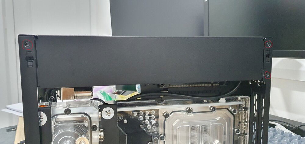 Remove circled screws to help get radiator in.