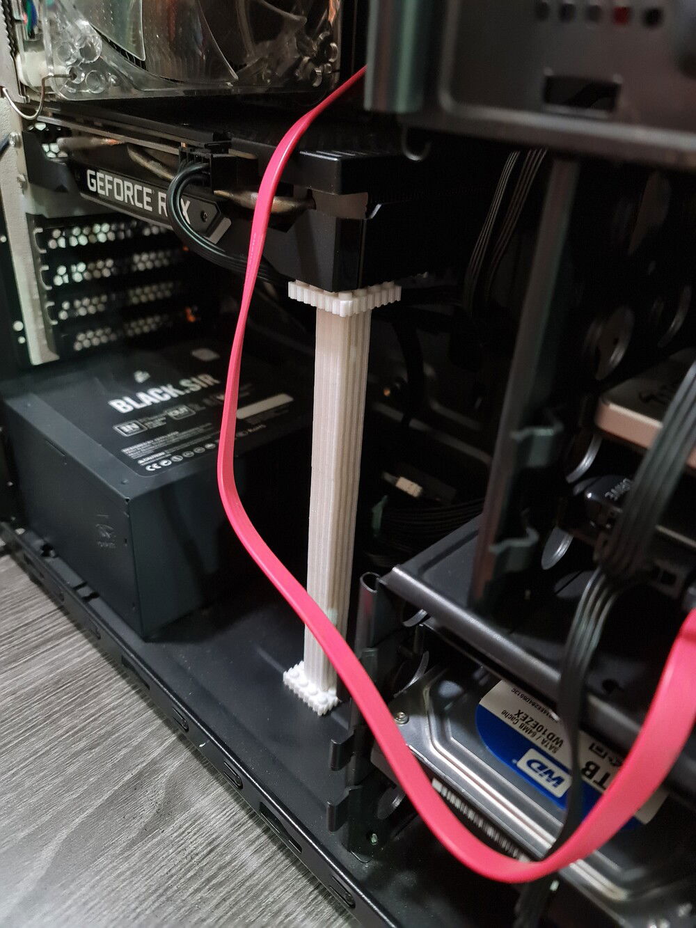 Since I have those knock-off lego pieces laying around, why not build a lego holder for gpu instead?