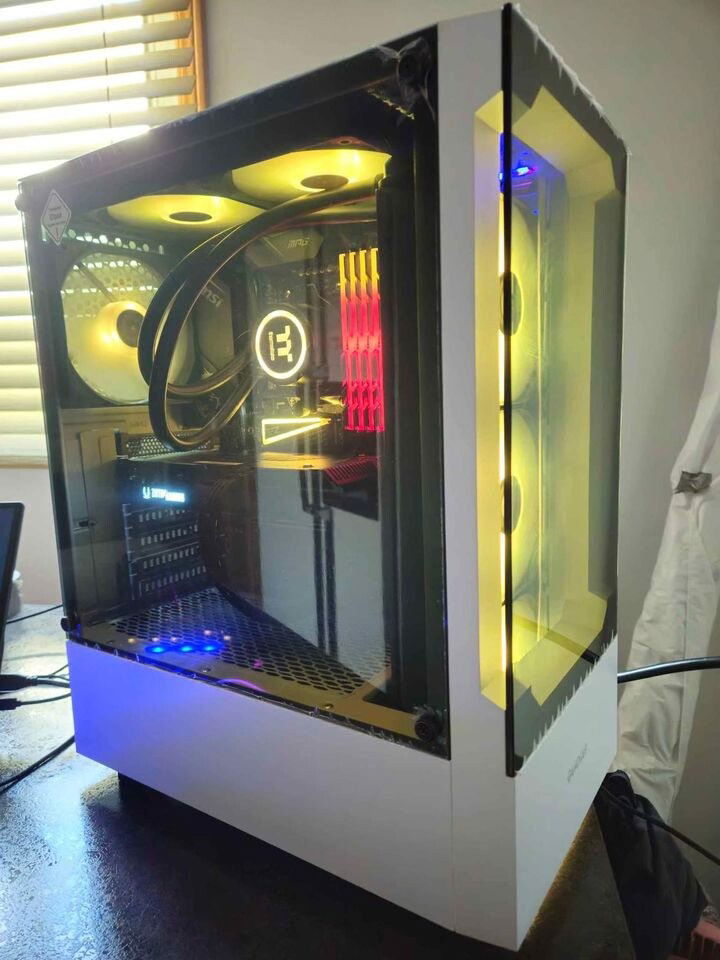 [b]Case:[/b] Zeus Gamdias White ARGB Gaming ATX Mid Tower Case

[b]OS:[/b] Microsoft Windows 11 Professional 64-bit

[b]Motherboard:[/b] MSI X570S EDGE MAX WIFI

[b]CPU:[/b] Ryzen 5900x 12 Cores / 24 Threads 4.80GHz

[b]Cooler:[/b] Black Thermaltake Water 3.0 360m Liquid Cooling

[b]FANS:[/b] 6x Black ARGB 120mm Case Fans [Addressable RGB]

[b]RAM:[/b] 32GB 3200Mhz Trident Z RGB Memory [4x 8GB]

[b]SSD M.2 #1:[/b] 1TB M.2 NMVe 4.0 Solid State Drive [Up To 4,800Mb/s]

[b]SSD N.2 #2:[/b] 1Tb M.2 NVMe Solid State Drive Under Motherboard Heatsink

[b]GPU:[/b] Black Zotac Gaming Twin Edge GeForce RTX 3060 Ti 8GB OC 256-bit

[b]PSU:[/b] Corsair CX850M Power Supply
[850 Watts Power Supply]

2.50GBps Onboard LAN / Wi-Fi 6E AX210 / Bluetooth 5.2

Custom Black Sleeved Power Cables, ARGB Controlled By MSI RGB Software See less