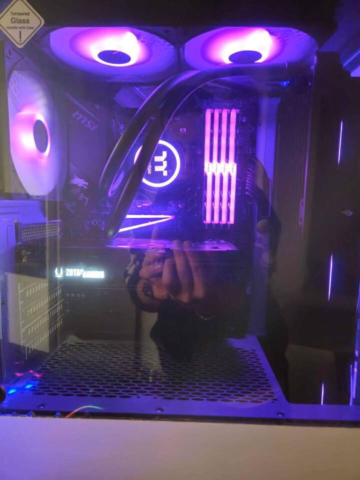 [b]Case:[/b] Zeus Gamdias White ARGB Gaming ATX Mid Tower Case

[b]OS:[/b] Microsoft Windows 11 Professional 64-bit

[b]Motherboard:[/b] MSI X570S EDGE MAX WIFI

[b]CPU:[/b] Ryzen 5900x 12 Cores / 24 Threads 4.80GHz

[b]Cooler:[/b] Black Thermaltake Water 3.0 360m Liquid Cooling

[b]FANS:[/b] 6x Black ARGB 120mm Case Fans [Addressable RGB]

[b]RAM:[/b] 32GB 3200Mhz Trident Z RGB Memory [4x 8GB]

[b]SSD M.2 #1:[/b] 1TB M.2 NMVe 4.0 Solid State Drive [Up To 4,800Mb/s]

[b]SSD N.2 #2:[/b] 1Tb M.2 NVMe Solid State Drive Under Motherboard Heatsink

[b]GPU:[/b] Black Zotac Gaming Twin Edge GeForce RTX 3060 Ti 8GB OC 256-bit

[b]PSU:[/b] Corsair CX850M Power Supply
[850 Watts Power Supply]

2.50GBps Onboard LAN / Wi-Fi 6E AX210 / Bluetooth 5.2

Custom Black Sleeved Power Cables, ARGB Controlled By MSI RGB Software See less