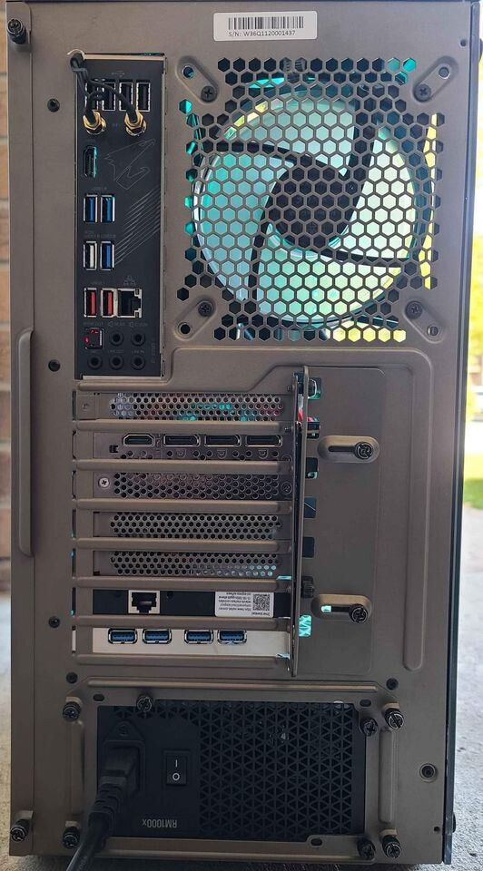 [b]Case:[/b] Mid-Size BeQuiet Case

[b]OS:[/b] Microsoft Windows 11 Professional 64-bit

[b]Motherboard:[/b] Gigabyte X570 Aorus Elite WiFi

[b]CPU:[/b] Ryzen 5800x 8C/16T CPU AM4

[b]Cooler:[/b] AORUS WATERFORCE 360

[b]RGB:[/b] 4x ARGB Light Strips,

[b]FANS:[/b] 6x ARGB Fans Controlled By Gigabyte RGB

[b]RAM:[/b] 2x 16GB Corsair Vengeance 3600MHz DDR4 Memory

[b]SSD:[/b] 2x WD Black SN770 500GB PCIE 4.0 SSD Raid Together - 1TB Total

[b]HDD:[/b] 2x 8TB Seagate 3.5" SATA6 Hard Drives - 16TB Total

[b]GPU:[/b] MSI Gaming Trio X RTX 3090 24GB With Box

[b]PSU:[/b] 1000watts CORSAIR RMX Series RM1000x 80 Plus Gold Fully Modular ATX Power Supply

Custom Cablemod Cables On GPU And Motherboard Power

[b]LAN:[/b] 2.50GB PCIE Ethernet Card