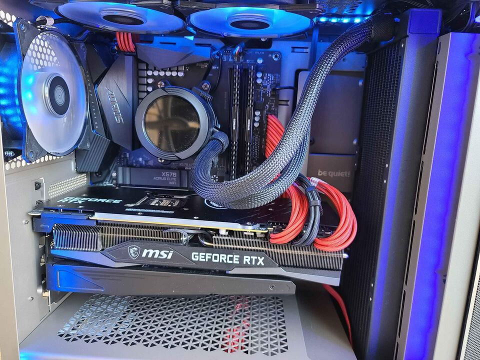 [b]Case:[/b] Mid-Size BeQuiet Case

[b]OS:[/b] Microsoft Windows 11 Professional 64-bit

[b]Motherboard:[/b] Gigabyte X570 Aorus Elite WiFi

[b]CPU:[/b] Ryzen 5800x 8C/16T CPU AM4

[b]Cooler:[/b] AORUS WATERFORCE 360

[b]RGB:[/b] 4x ARGB Light Strips,

[b]FANS:[/b] 6x ARGB Fans Controlled By Gigabyte RGB

[b]RAM:[/b] 2x 16GB Corsair Vengeance 3600MHz DDR4 Memory

[b]SSD:[/b] 2x WD Black SN770 500GB PCIE 4.0 SSD Raid Together - 1TB Total

[b]HDD:[/b] 2x 8TB Seagate 3.5" SATA6 Hard Drives - 16TB Total

[b]GPU:[/b] MSI Gaming Trio X RTX 3090 24GB With Box

[b]PSU:[/b] 1000watts CORSAIR RMX Series RM1000x 80 Plus Gold Fully Modular ATX Power Supply

Custom Cablemod Cables On GPU And Motherboard Power

[b]LAN:[/b] 2.50GB PCIE Ethernet Card