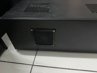 Solution: simple. Mount fan filter to outside.