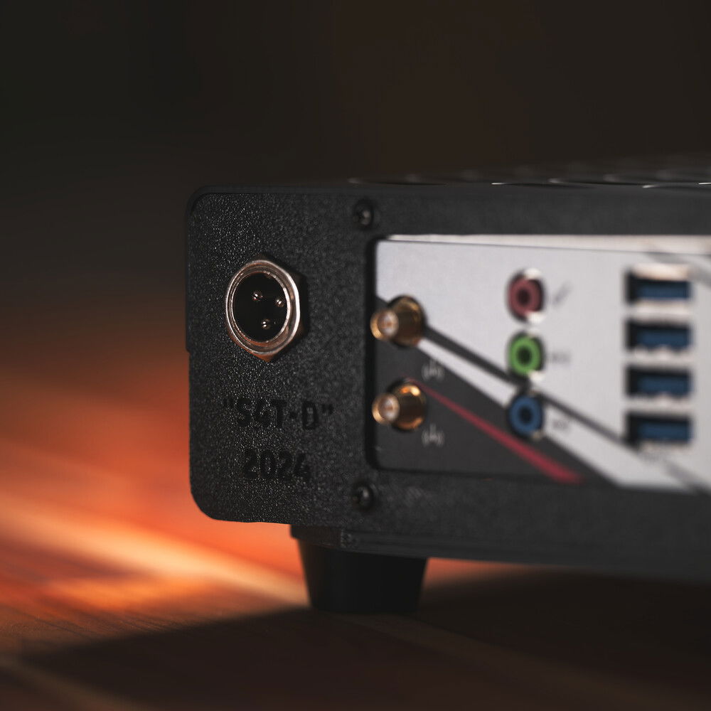 One of the standout features of the TINY is swappable rear IO. This alows for easy and endless customization; for this build I opted for one 16mm cutout for a GX16 AC outlet. The power supply is all internal--no bricks!
