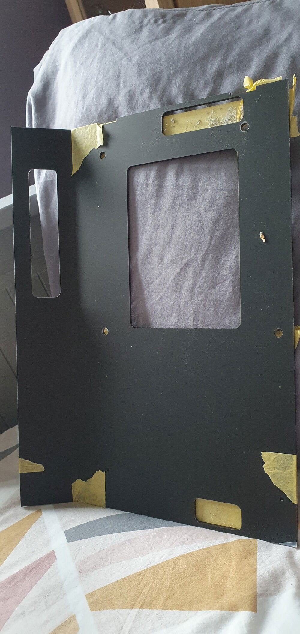 Acrylic mobo tray hides all the cable/mounting holes.