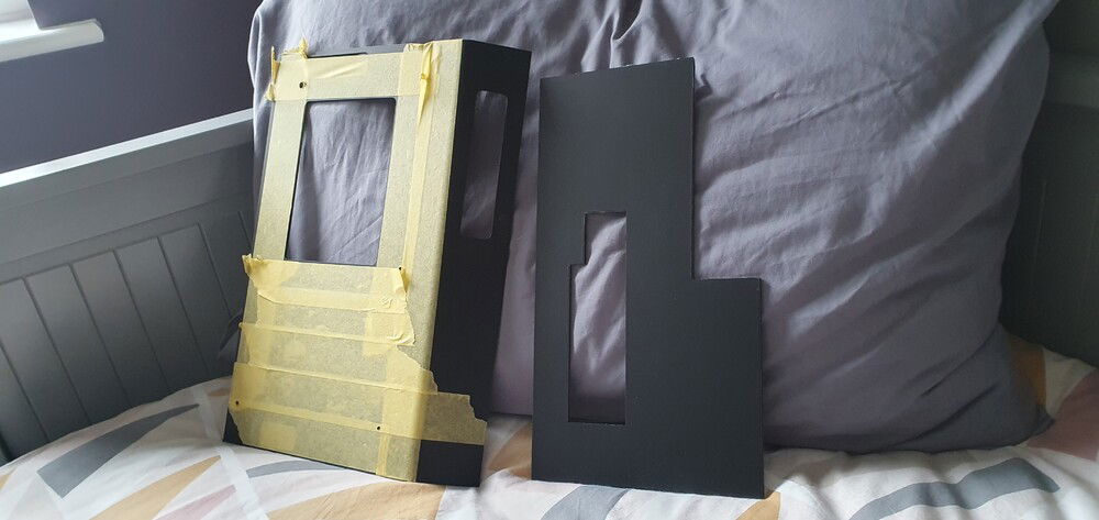 Rear panel to hide the messy IO panel. I also cut away the gpu support tray from the lian li vertical mount.
The acrylic was cut on a cheap diode laser, and it shows haha.