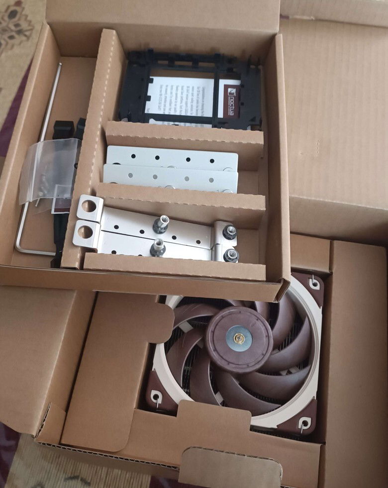 I got this NH-U12S DX-3647 because that was the only realistic option at the time but I might change it for either the (sadly and strangely much more expensive) 4U compatible version so I can close the case or, if it comes down to it, a homebrew cooler made out of spare parts