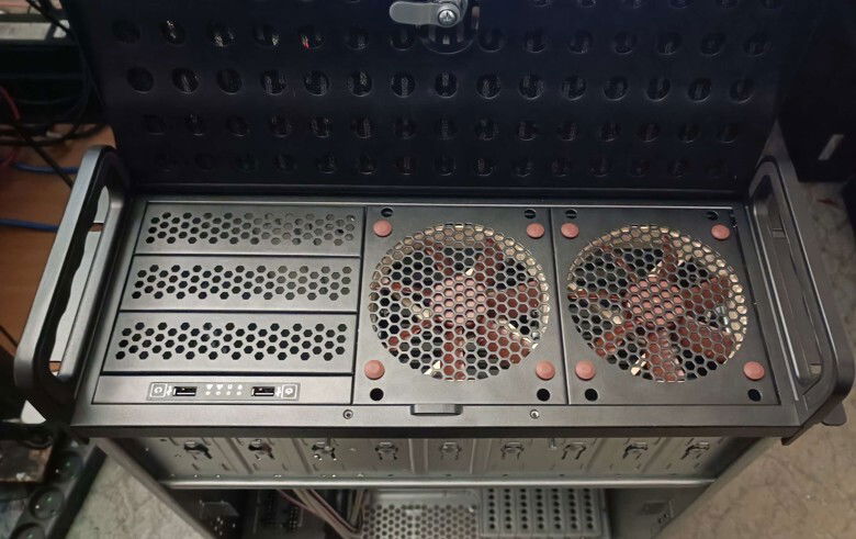 fan carriers slotted back in and screwed in