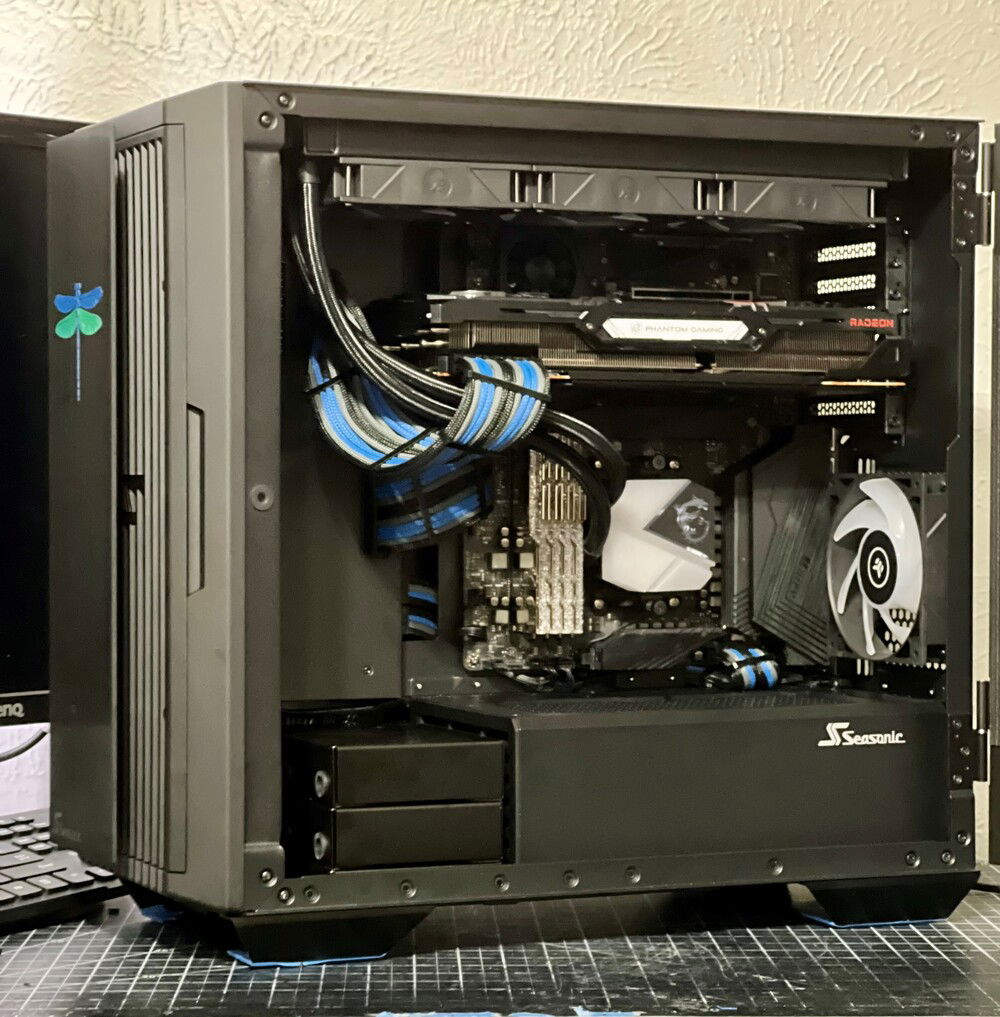 No GPU sag in this position, so that was nice. In retrospect, I should have flipped the rear fan to intake to help with the limited front panel - but again, temps were fine in this configuration.