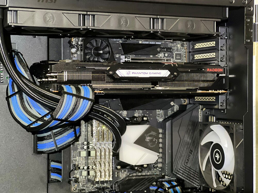 I make all my own sleeved cables. The 24-pin was comically short, but they end up being incredibly clean. Even the stock cables would have looked pretty nice, although they're not sleeved.