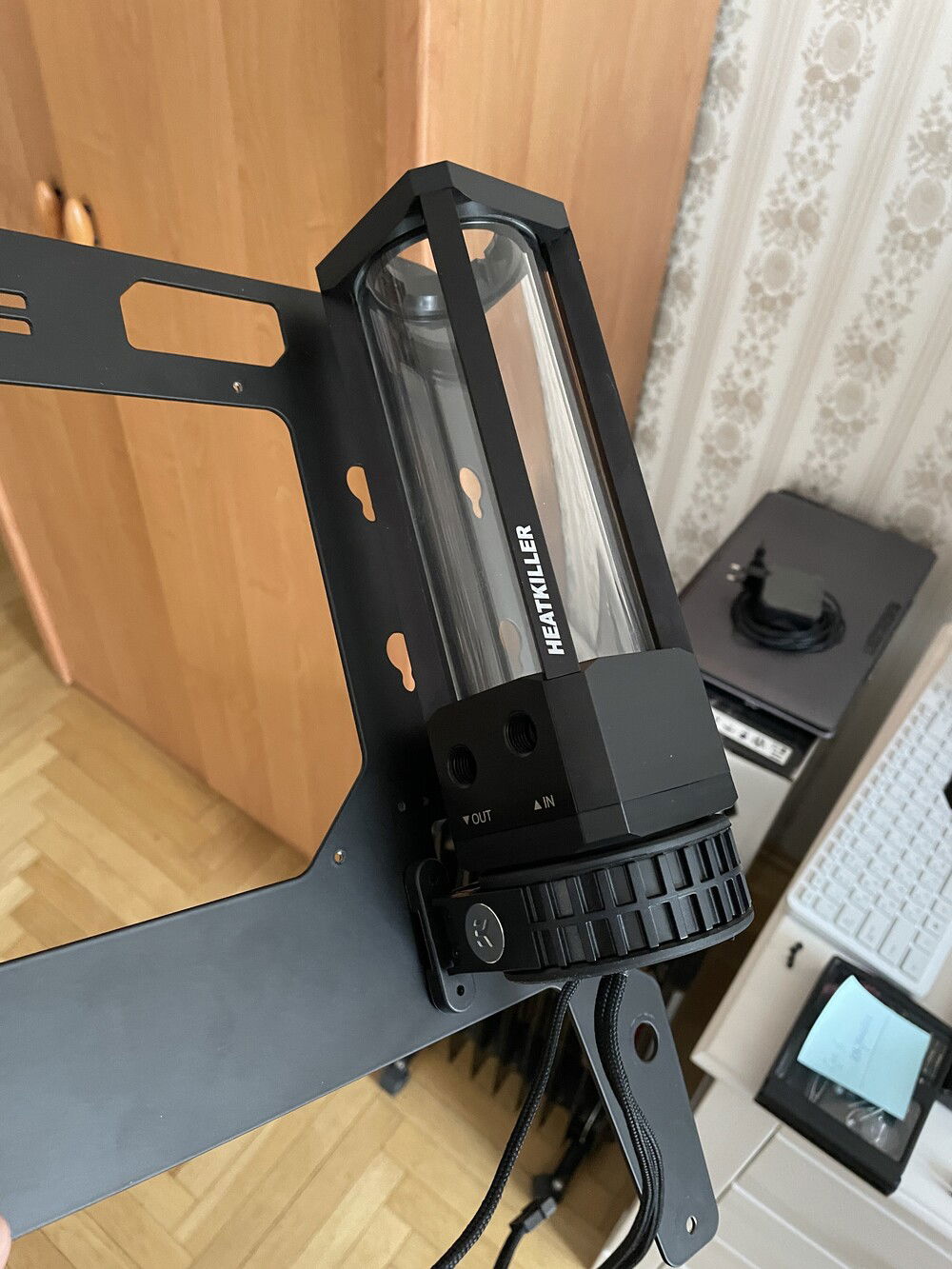 Done the drilling and now the tube sits where it should. As you can see I used EK's pump plastic stand support.