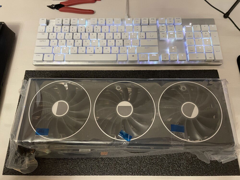 The GPU size compared to regular keyboard with numpad. Quite impressive.