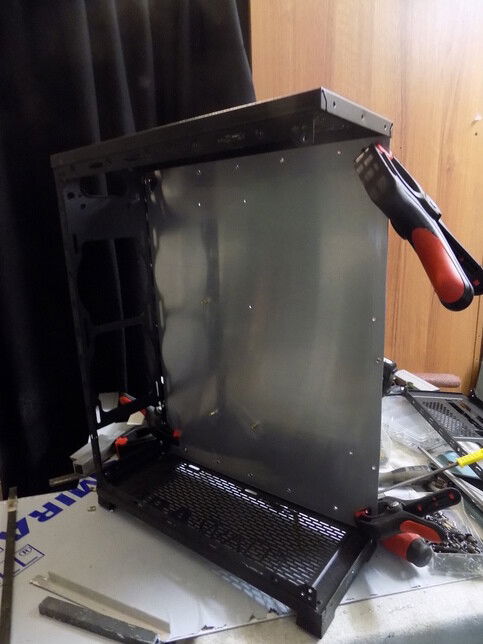 holes for the motherboard and case attachement