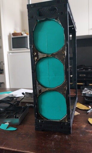 cardboard template with fan openings