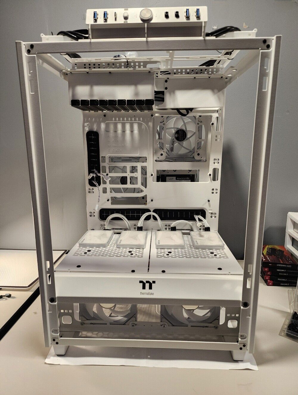Front view of the open tower with ssd drives and fans installed.