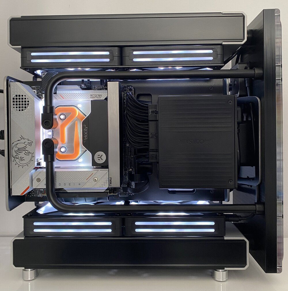 Additionally, I made a few minor adjustments:
 1. Replaced the acrylic tubing with black brass ones.
 2. Increased the gap between the desk and the bottom radiator by using taller feet.