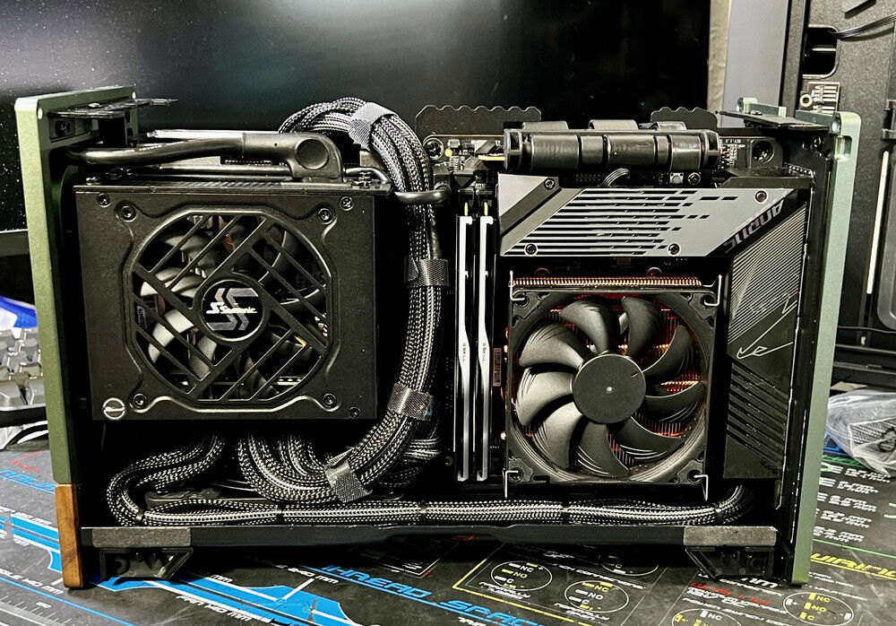 New PSU. Had to completely re-do the cables, unfortunately. Due to the size of the GPU, I couldn't make space for cables behind the PSU. Had to route them up the side between the PSU and motherboard, which worked out fine.