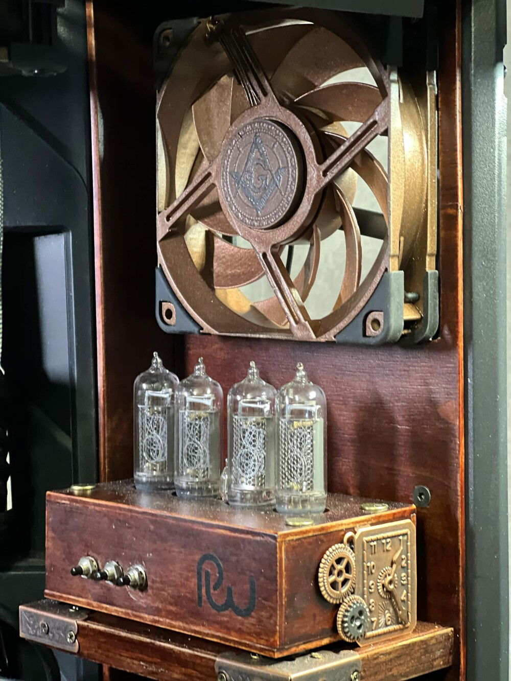 Masonic lodge coins to cover the rear of the fans. I used paint to add accents and shadowing to them.
