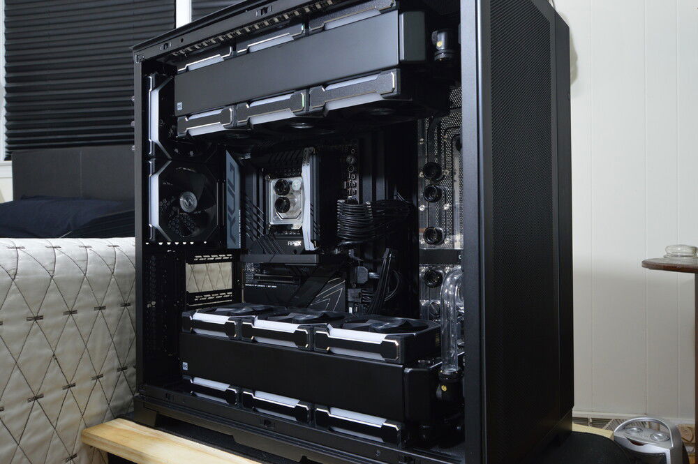 The mockup photos show my build with an EK CPU block, but the final build uses an Optimus water block.