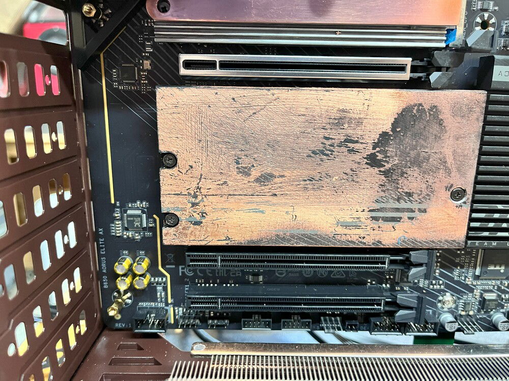 The other SSD cover and heat sinks look like crap, so I started to cover up with leaf, It was not smooth and looked like crap so I cleaned it off.  In the process I saw a future build using a the technique that has become instream with older trucks using a patina making it look old and rusty.   

I was not done wityh this part of the MB yet.