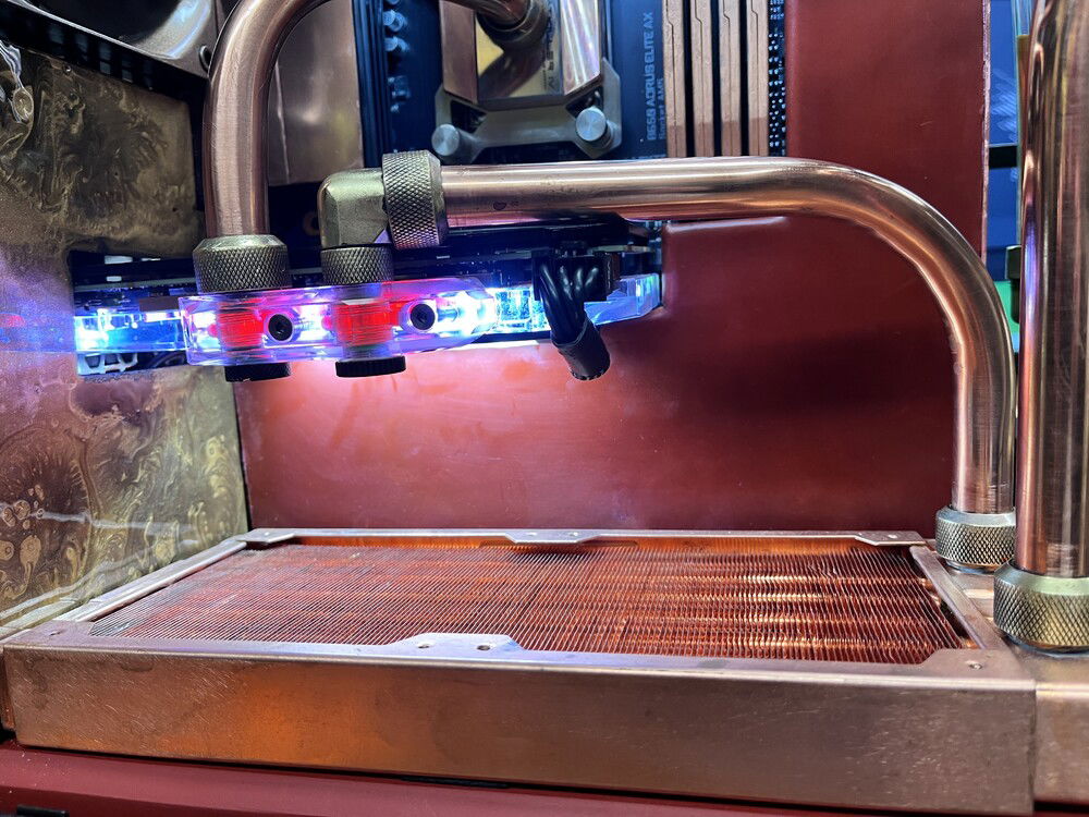 The next pipe was from radiator to GPU return. Fairly straight forward, but very tight in terms of the connectors.  Yes, I know that there are 1 inch extensions, but I learned of the options later.  The whole fitting thing is an absolute racket and a royal pin in the arse.  And no you do not have to buy from these folks, you can actually use automotive NPT 1/4 connectors and they have almost as many choices, however, not in color, but there are ways around that as well.