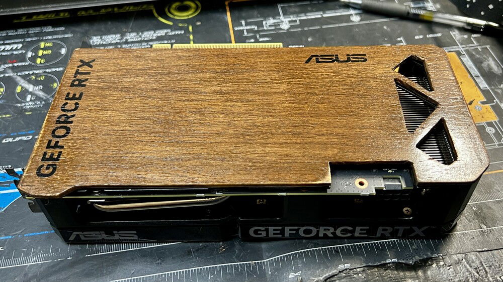 I had to cut a notch in the top left to fit around the rear IO components. I ended up removing the "GEFORCE" logo because of that.
