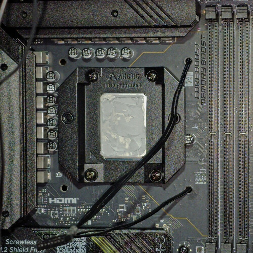 sheathed & ran leads for CPU-cooler through mobo