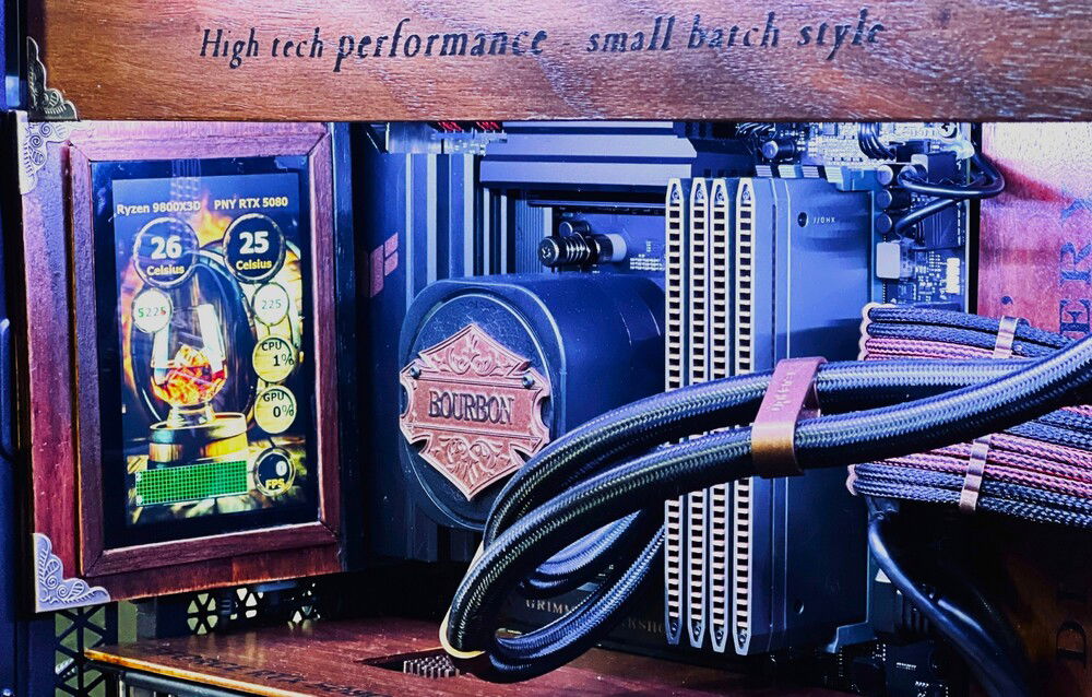 The stats monitor uses Aida64 and a custom UI I designed.