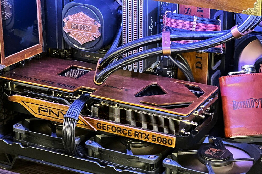 I carried over the GPU's branding on the walnut panels. I think it makes the mod look more organic, like it was made this way.