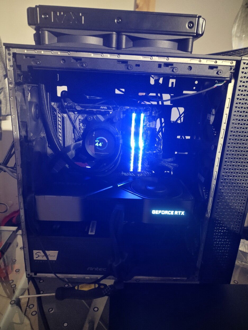 Open case. VRMs may not be getting the best cooling if warm air is pooling. I will be taking the glass side panel to a glass cutter so that the GPU cables can be fed through. Three 120mm intake fans at the front, two 80mm exhaust fans at the rear, the AIO 240mm drawing air through the top as well. The GPU fans rest at idle.