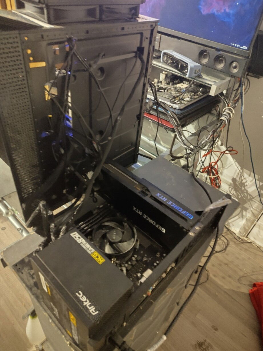 Back up PSU (Antec HCG 850 80+ Gold). Some of the original components are living on the test bench but out of use for now. The 1300W Signature PSU failed tonight, so this is my work around for now.