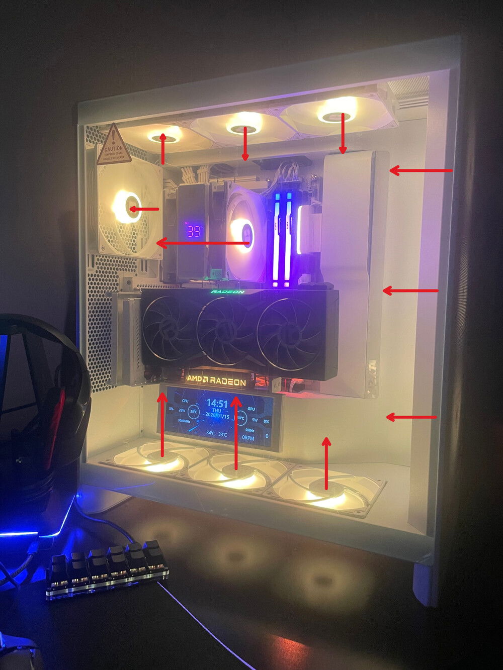 Air flow directions. The front most bottom is connected to it's own dedicated fan connector & set to spin at a slow speed so it doesn't create a vortex with the bottom most front fan.