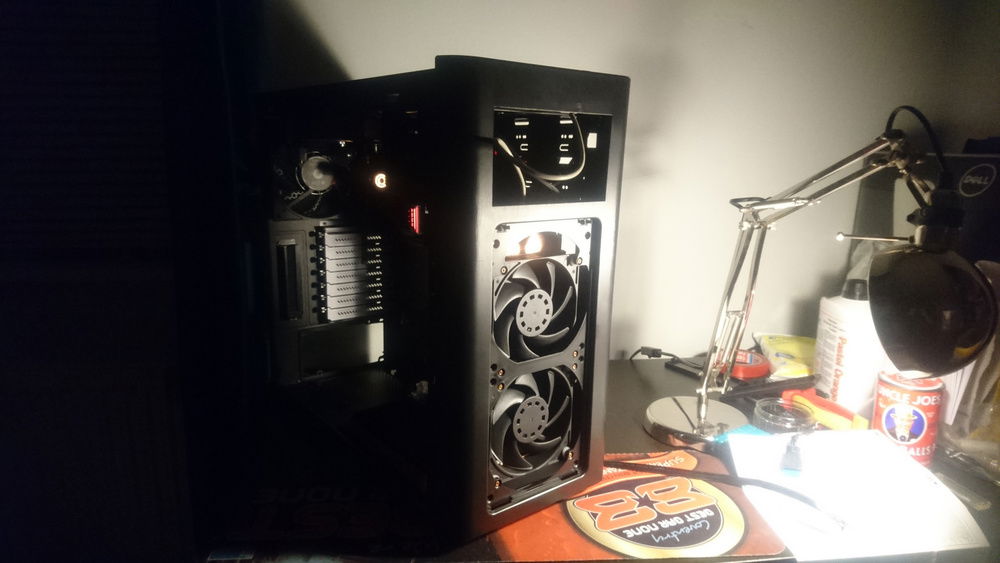 A sneak peak mid build. You can just see a glimpse of the ram and a copper fitting on the cpu block.