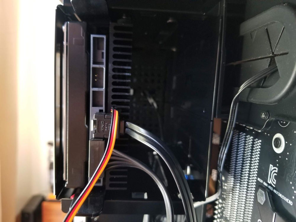 A shot of the drive and PSU side of the Air 740.
This shows the Scythe Ita Kaze HDD cooler.